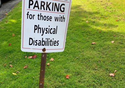 parking sign that says reserved for those with physical disabilities
